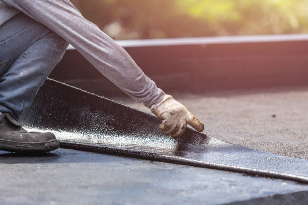 Professional Waterproofing technician working in Williston, OH